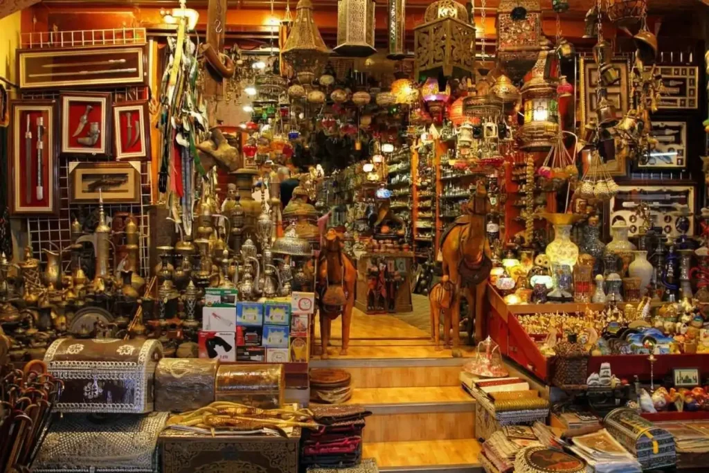 A shop stacked with lamps, brassware and gifts in Mutrah Souq