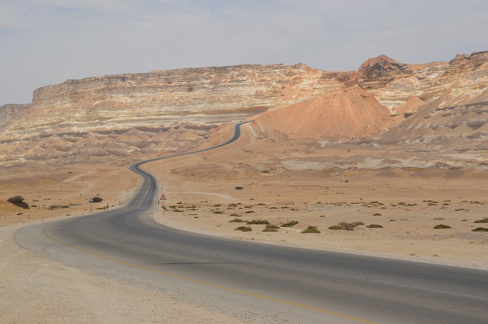 Road winding through desert hills